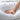 a hand on a white pillow with text: 'SOFT & ELASTICITY FABRIC CASE ------- Breathable Soft Support'