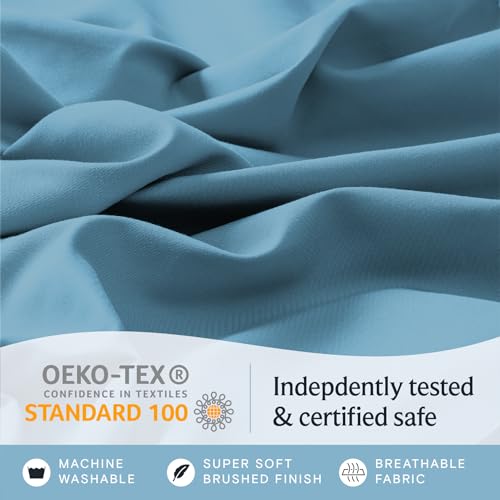 a close up of a fabric with text: 'OEKO-TEX Indepdently tested CONFIDENCE IN TEXTILES STANDARD 100 & certified safe MACHINE SUPER SOFT BREATHABLE WASHABLE BRUSHED FINISH FABRIC'