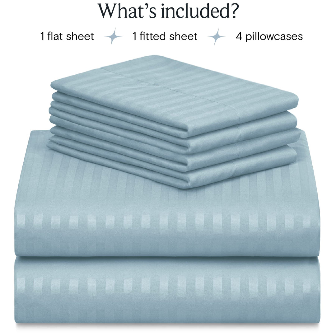 a stack of folded sheets with text: 'What's included? 1 flat sheet 1 fitted sheet 4 pillowcases'