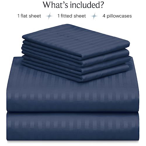 a stack of blue sheets with text: 'What's included? 1 flat sheet 1 fitted sheet 4 pillowcases'