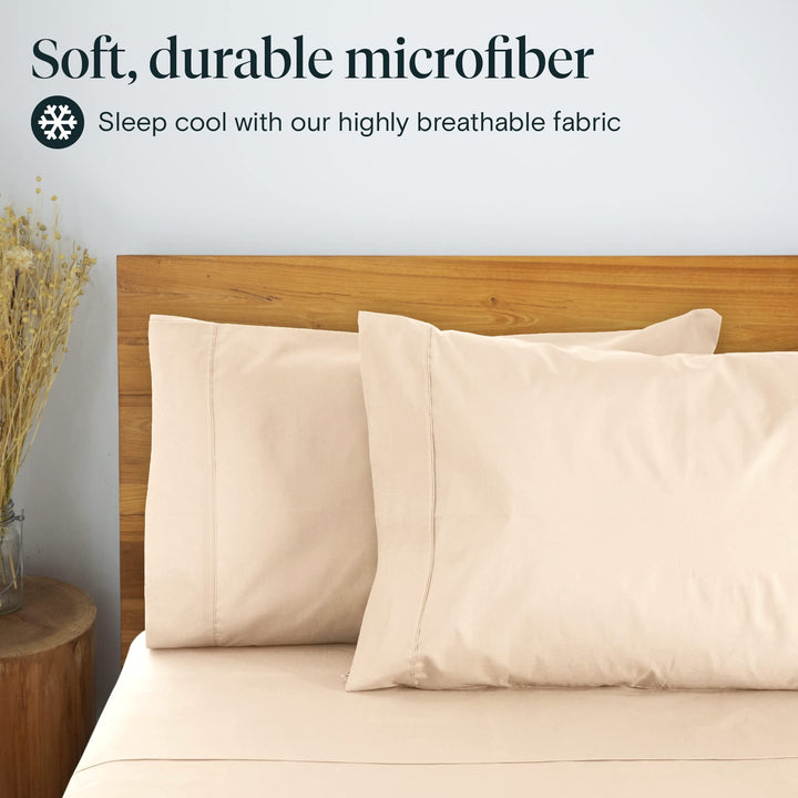 a bed with a wood headboard and a vase of dry flowers with text: 'Soft, durable microfiber Sleep cool with our highly breathable fabric'