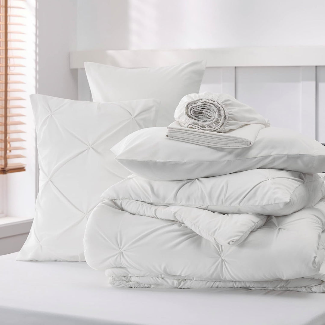 a stack of white bedding