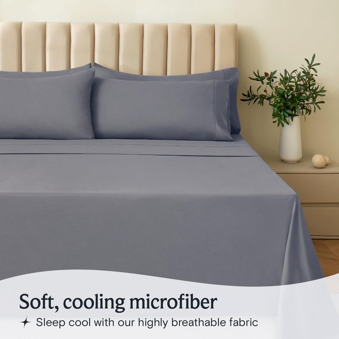 a bed with a plant in a vase with text: 'Soft, cooling microfiber Sleep cool with our highly breathable fabric'