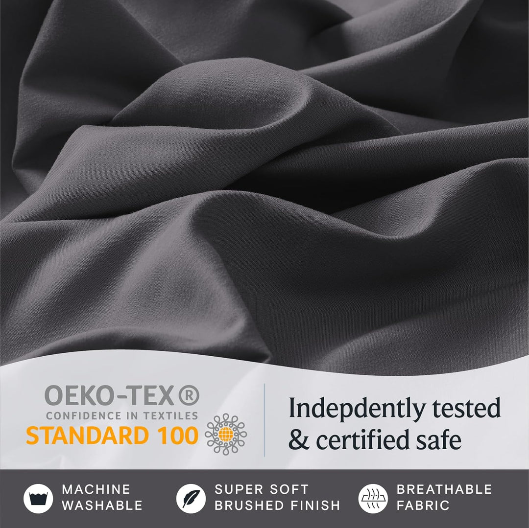 a close up of a fabric with text: 'OEKO-TEX Indepdently tested CONFIDENCE IN TEXTILES STANDARD 100 & certified safe MACHINE SUPER SOFT BREATHABLE WASHABLE BRUSHED FINISH FABRIC'