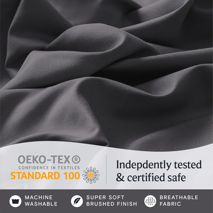 a close up of a fabric with text: 'OEKO-TEX Indepdently tested CONFIDENCE IN TEXTILES STANDARD 100 & certified safe MACHINE SUPER SOFT BREATHABLE WASHABLE BRUSHED FINISH FABRIC'