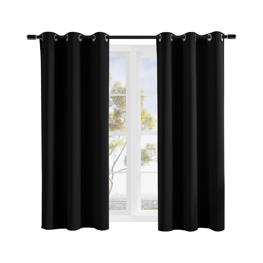 a window with black curtains