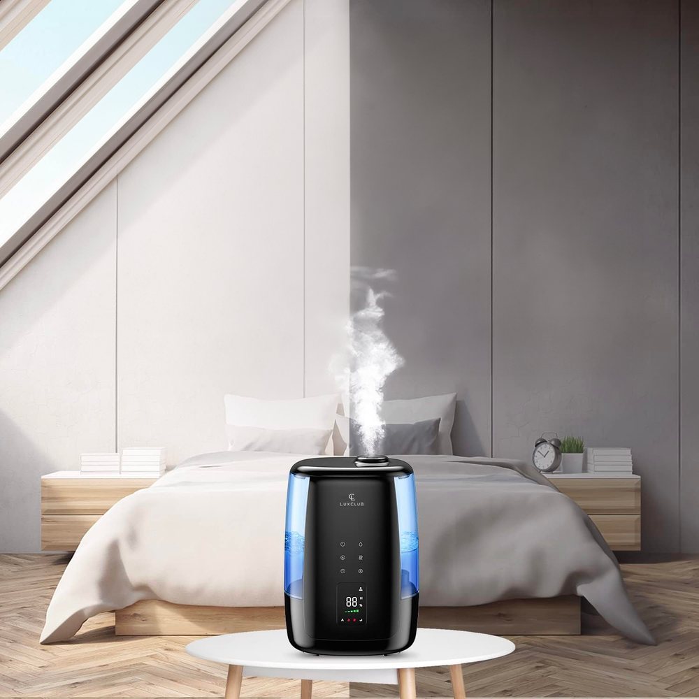 a humidifier on a table in a bedroom with text: 'LUB 88'