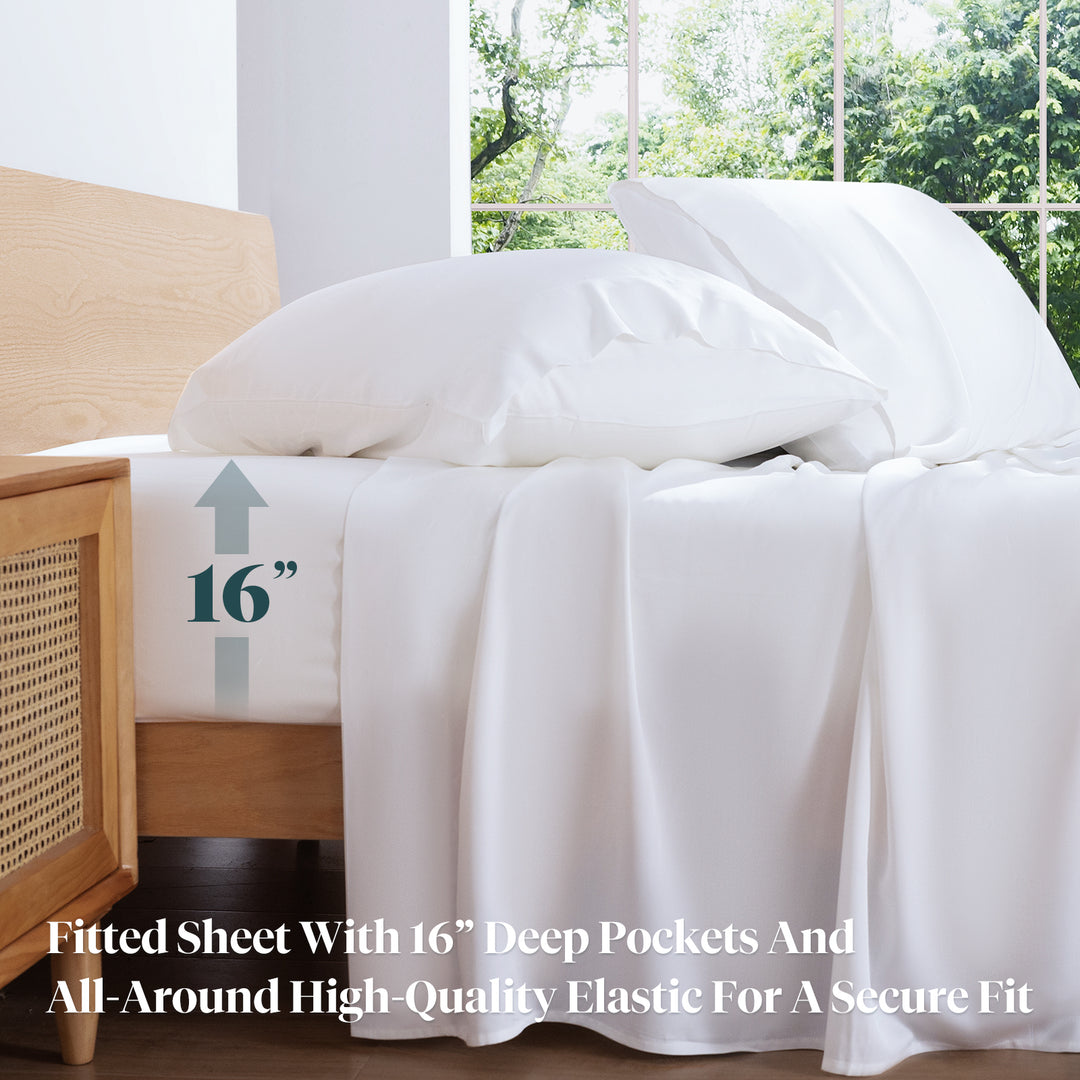 a bed with white sheets and pillows with text: '16" Fitted Sheet With 16" Deep Pockets And All-Around High-Quality Elastic For A Secure Fit'