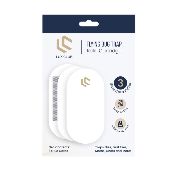 a white fly trap in a package with text: 'FLYING BUG TRAP Refill Cartridge LUX CLUB 3 Glue Refills Easy to Use Chemical Free Net. Contents: Traps Flies, Fruit Flies, 3 Glue Cards Moths, Gnats and More!'