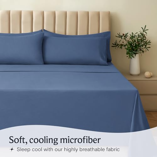 a bed with blue sheets and pillows with text: 'Soft, cooling microfiber Sleep cool with our highly breathable fabric'