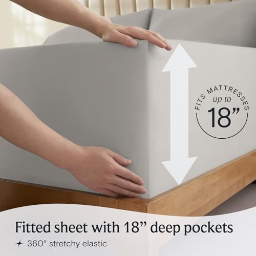 a person holding a mattress with text: 'up to FITS MA 18 Fitted sheet with 18" deep pockets 360º stretchy elastic'