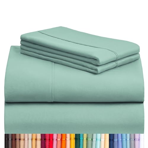 a stack of sheets and a few colored sheets