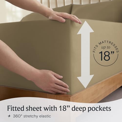 a person holding a box with a mattress with text: 'MATTRESSES up to 18 Fitted sheet with 18" deep pockets 360º stretchy elastic'