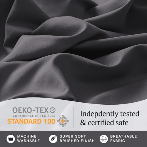 a close up of a fabric with text: 'OEKO-TEX Indepdently tested CONFIDENCE IN TEXTILES STANDARD 100 & certified safe MACHINE SUPER SOFT BREATHABLE WASHABLE BRUSHED FINISH FABRIC'