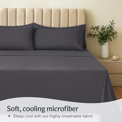 a bed with a plant in a vase with text: 'Soft, cooling microfiber Sleep cool with our highly breathable fabric'