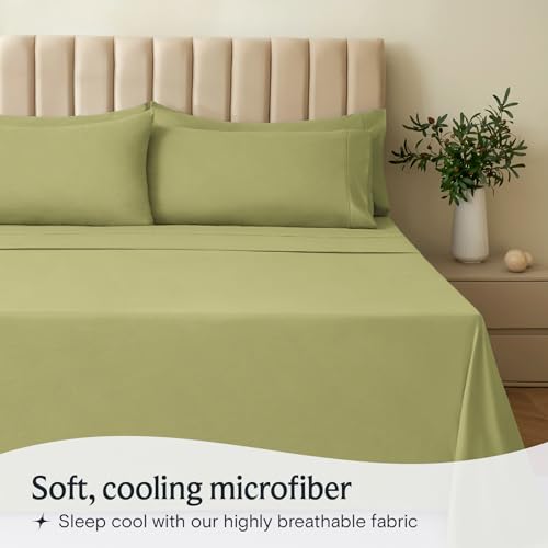 a bed with green sheets and a plant in a vase with text: 'Soft, cooling microfiber Sleep cool with our highly breathable fabric'