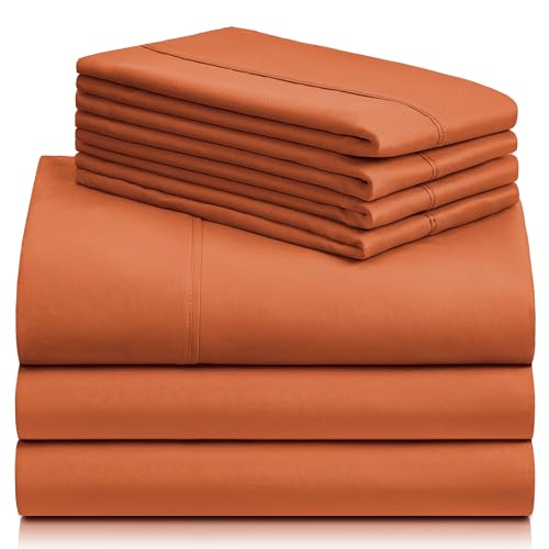 a stack of orange sheets