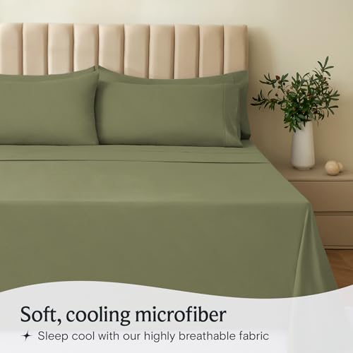 a bed with a plant in a vase with text: 'Soft, cooling microfiber Sleep cool with our highly breathable fabric'