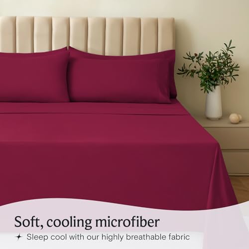 a bed with a red sheet and pillows with text: 'Soft, cooling microfiber Sleep cool with our highly breathable fabric'