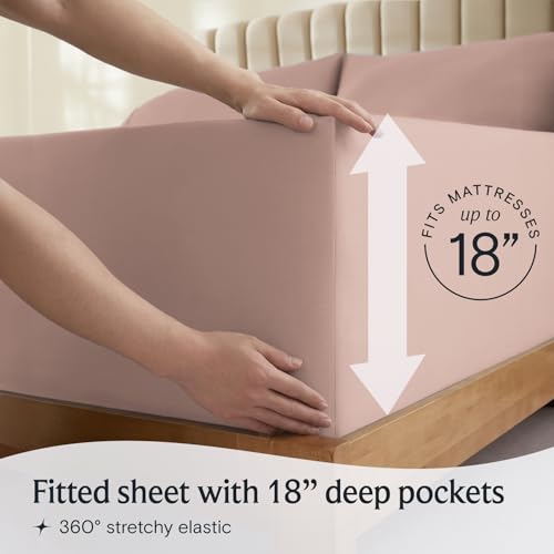 a person holding a mattress with text: 'RESSES FITS MA 18 Fitted sheet with 18" deep pockets 360º stretchy elastic'