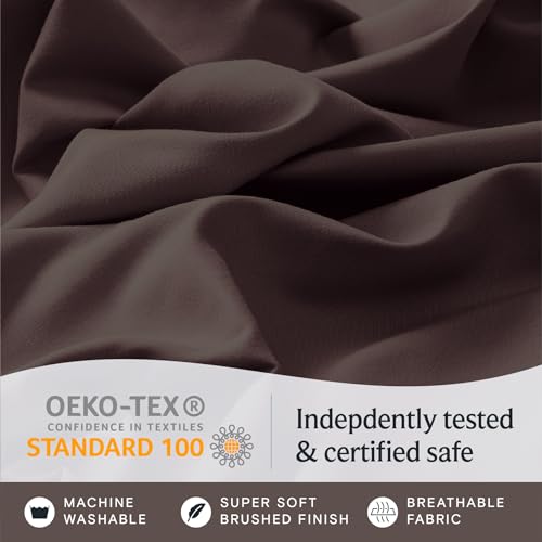 a close up of a fabric with text: 'OEKO-TEX Indepdently tested CONFIDENCE IN TEXTILES STANDARD 100 & certified safe MACHINE SUPER SOFT BREATHABLE WASHABLE BRUSHED FINISH FABRIC'