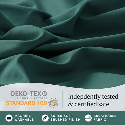 a close up of a fabric with text: 'OEKO-TEX Indepdently tested CONFIDENCE IN TEXTILES STANDARD 100 & certified safe MACHINE SUPER SOFT BREATHABLE WASHABLE BRUSHED FINISH FABRIC'