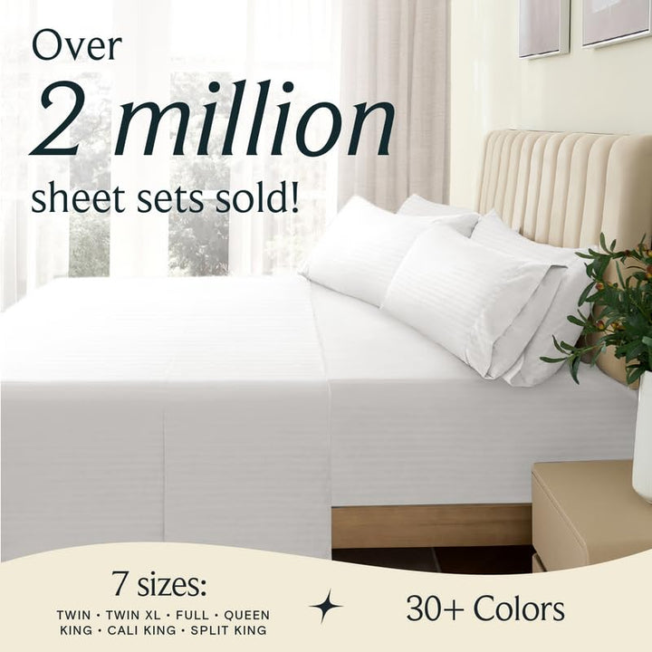 a bed with white sheets and a plant in a vase with text: 'Over 2 million sheet sets sold! 7 sizes: 30+ Colors TWIN TWIN XL FULL QUEEN KING CALI KING SPLIT KING'