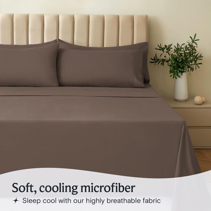 a bed with a vase of flowers with text: 'Soft, cooling microfiber Sleep cool with our highly breathable fabric'