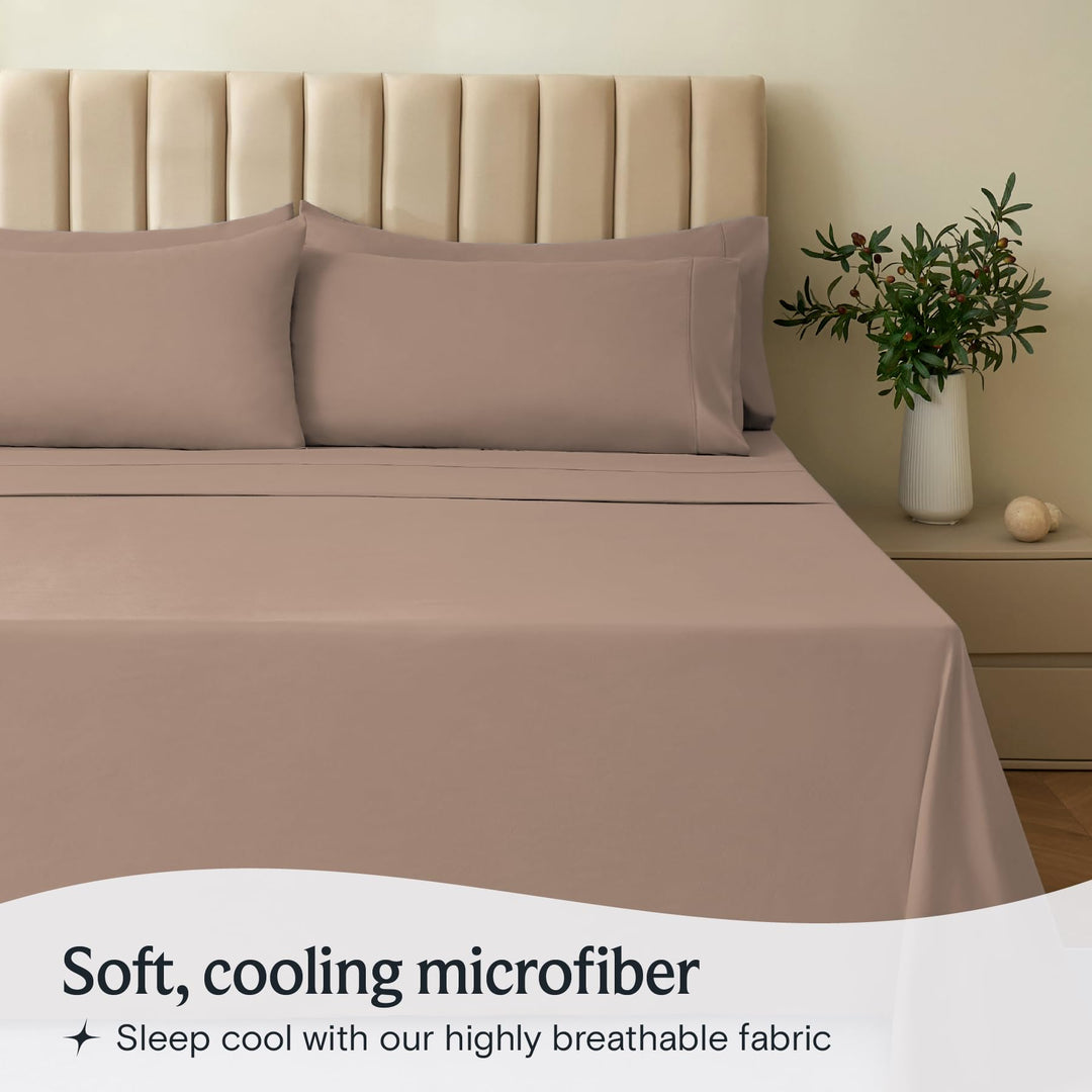 a bed with a vase of flowers with text: 'Soft, cooling microfiber Sleep cool with our highly breathable fabric'
