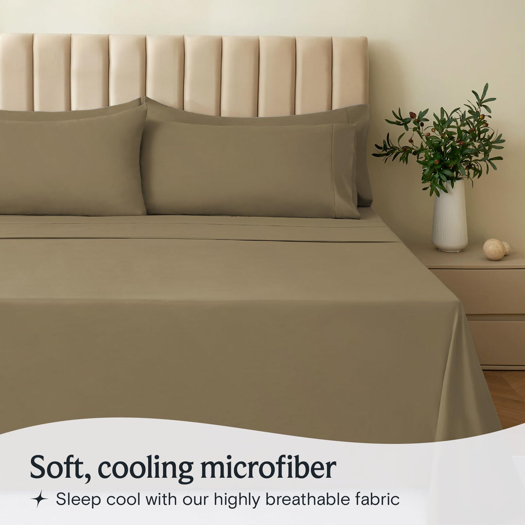 a bed with a vase of flowers with text: 'Soft, cooling microfiber Sleep cool with our highly breathable fabric'