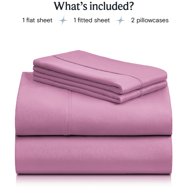 a stack of pink sheets with text: 'What's included? 1 flat sheet 1 fitted sheet 2 pillowcases'