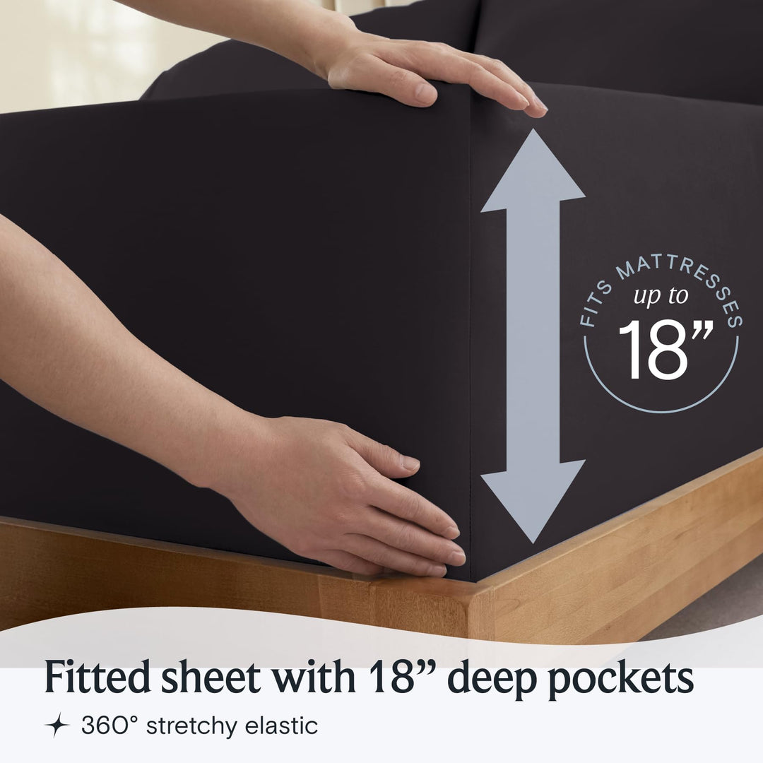 a person holding a mattress with text: 'RESSES FITS 18' Fitted sheet with 18" deep pockets 360º stretchy elastic'