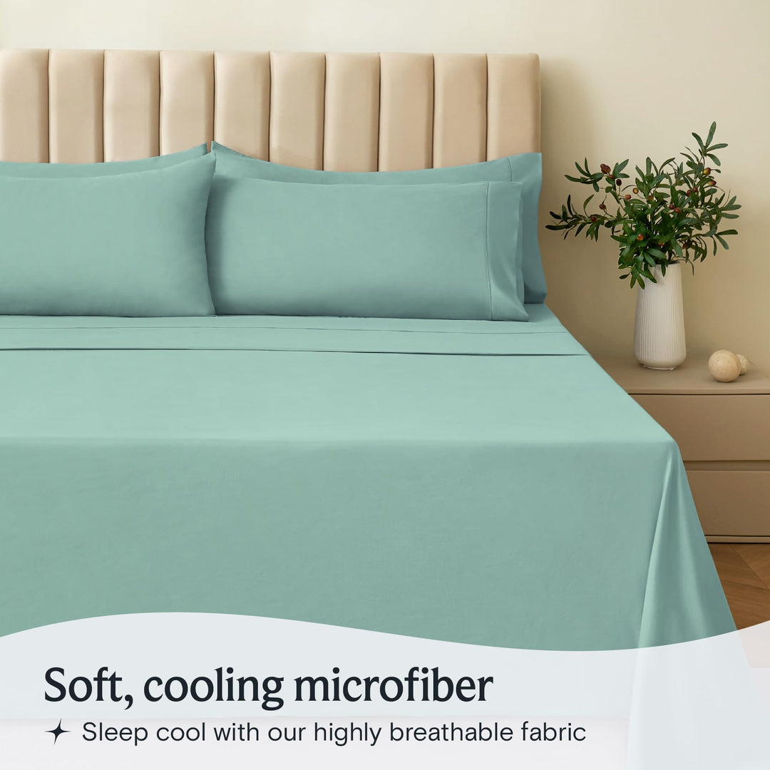 a bed with a plant in a vase with text: 'Soft, cooling microfiber Sleep cool with our highly breathable fabric'