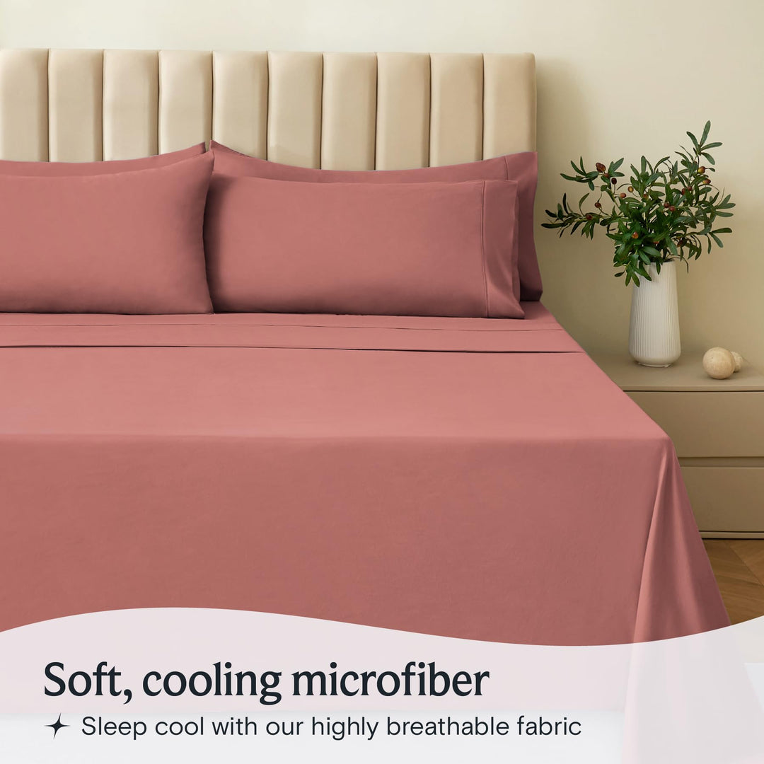a bed with pink sheets and pillows with text: 'Soft, cooling microfiber Sleep cool with our highly breathable fabric'