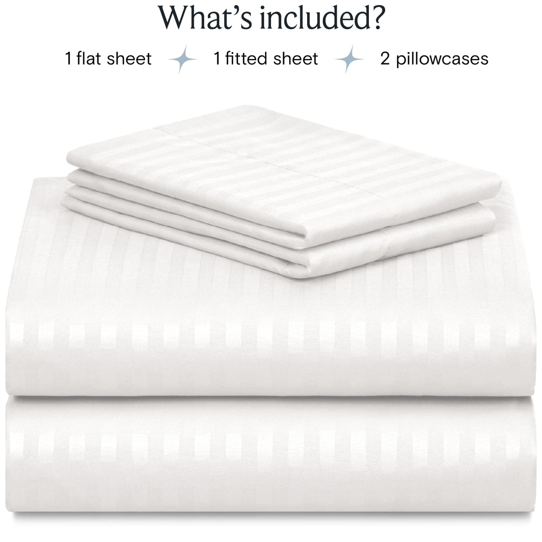 a stack of white sheets with text: 'What's included? 1 flat sheet 1 fitted sheet 2 pillowcases'