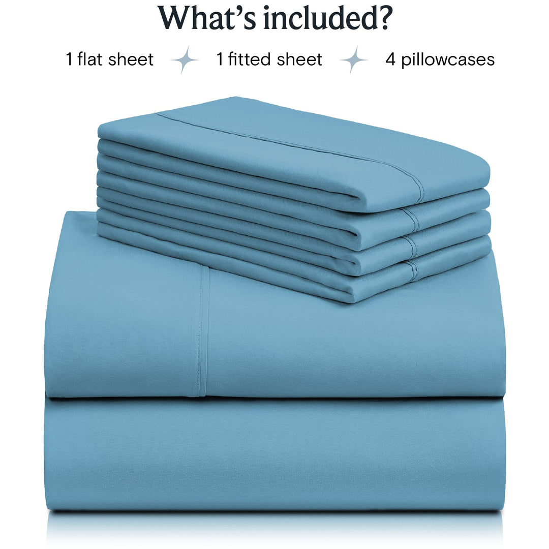 a stack of blue sheets with text: 'What's included? 1 flat sheet 1 fitted sheet 4 pillowcases'