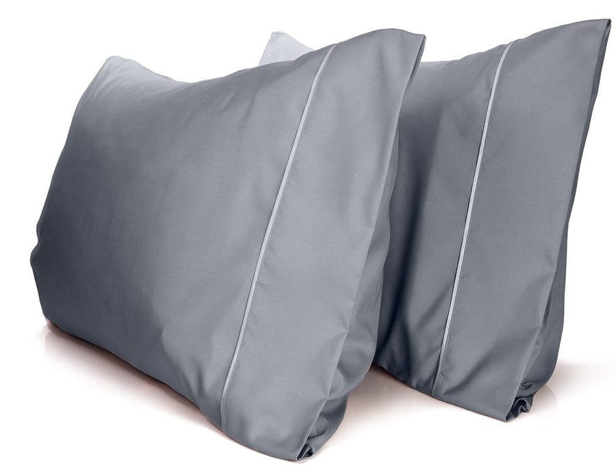 a pair of grey pillows