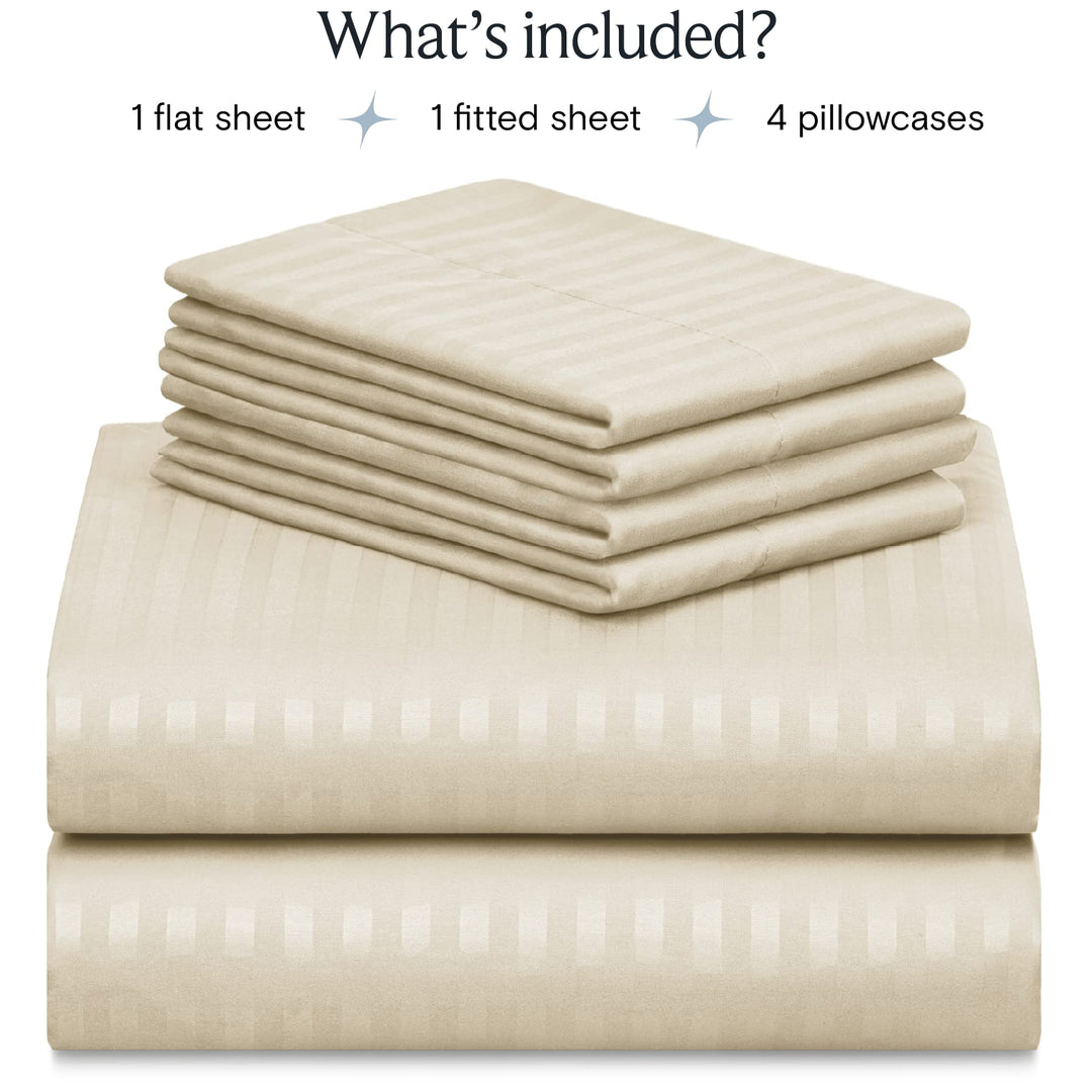 a stack of white sheets with text: 'What's included? 1 flat sheet 1 fitted sheet 4 pillowcases'