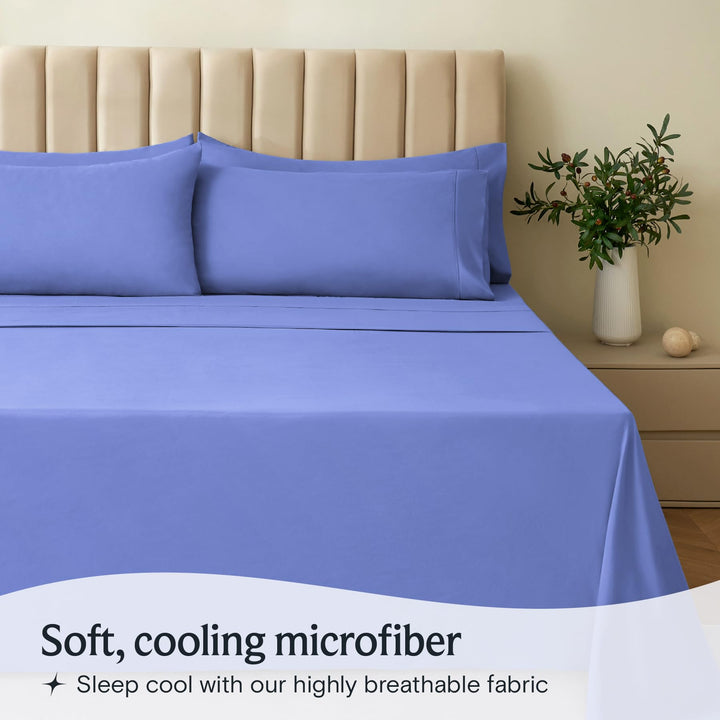 a bed with a blue sheet and pillows with text: 'Soft, cooling microfiber Sleep cool with our highly breathable fabric'