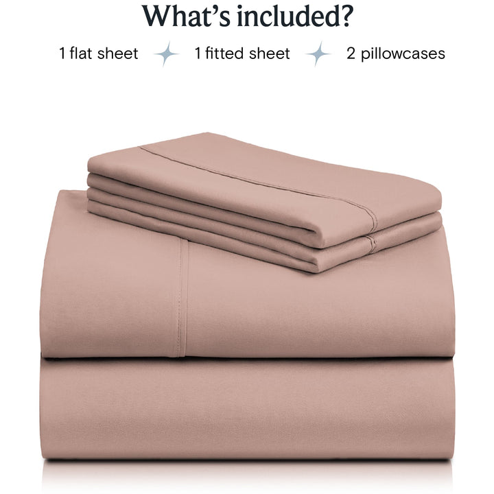 a stack of pink sheets with text: 'What's included? 1 flat sheet 1 fitted sheet 2 pillowcases'