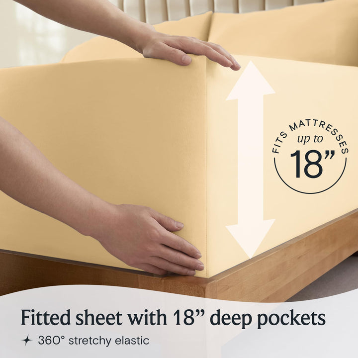 a person holding a mattress with text: 'RESSES FITS 18 Fitted sheet with 18" deep pockets 360º stretchy elastic'