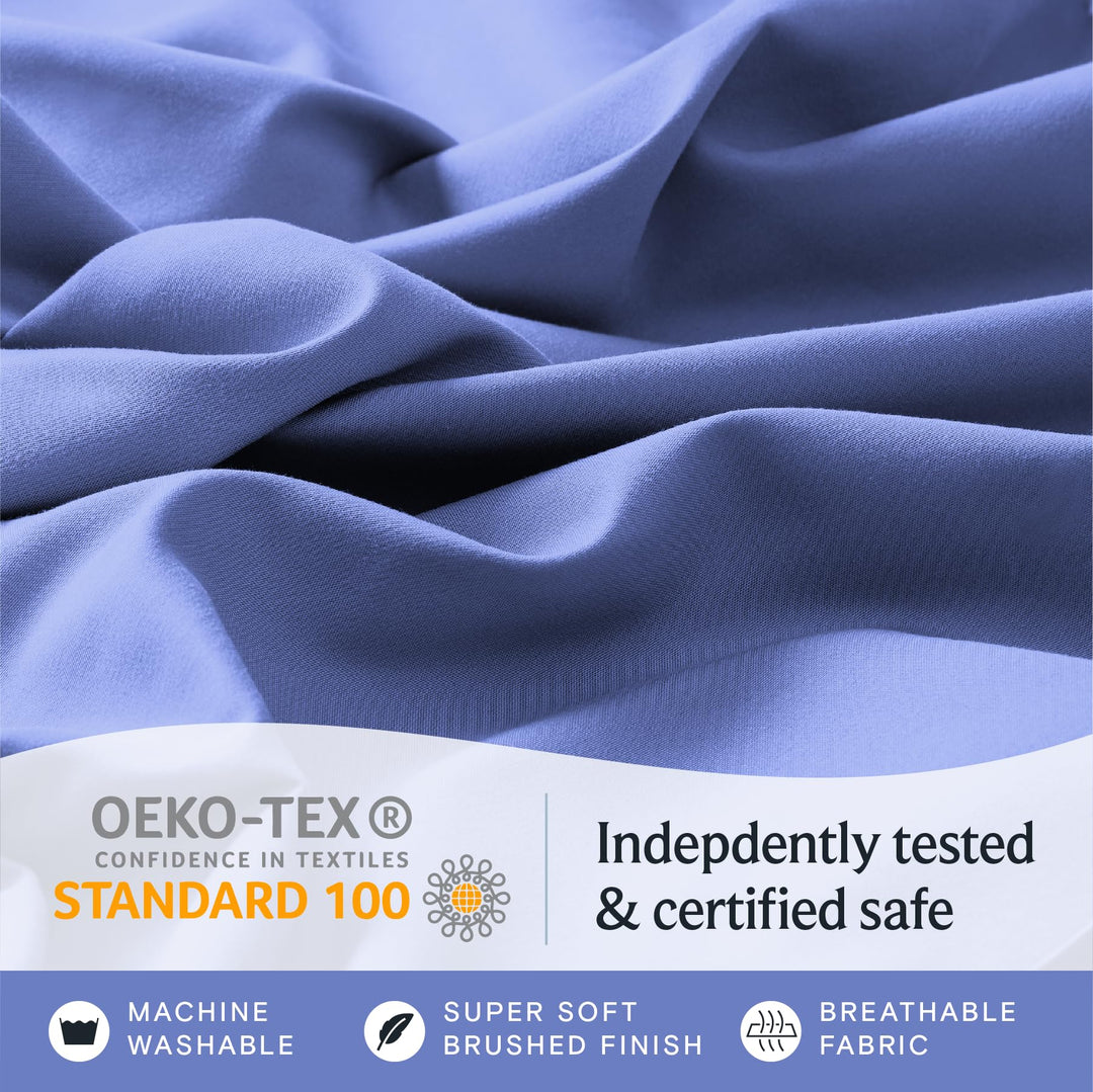 a close up of a fabric with text: 'OEKO-TEX Indepdently tested CONFIDENCE IN TEXTILES STANDARD 100 & certified safe MACHINE SUPER SOFT BREATHABLE WASHABLE BRUSHED FINISH FABRIC'