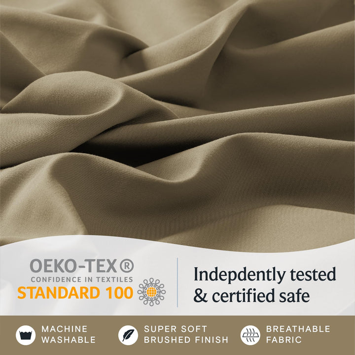 a close up of a fabric with text: 'OEKO-TEX Indepdently tested CONFIDENCE IN TEXTILES STANDARD 100 & certified safe MACHINE SUPER SOFT BREATHABLE WASHABLE BRUSHED FINISH FABRIC'