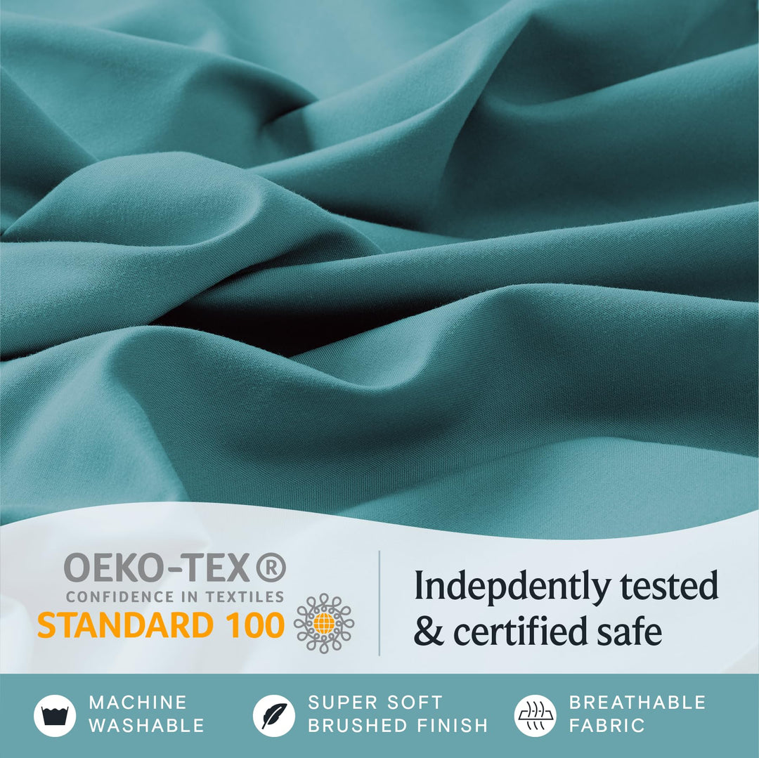 a close up of a fabric with text: 'OEKO-TEX ® Indepdently tested CONFIDENCE IN TEXTILES STANDARD 100 & certified safe MACHINE SUPER SOFT BREATHABLE WASHABLE BRUSHED FINISH FABRIC'