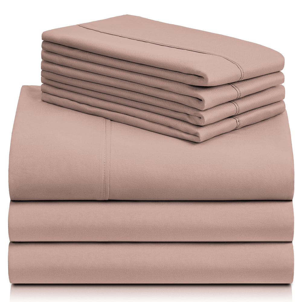 a stack of pink sheets